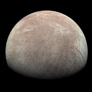 Europa, the smallest of the four Galilean moons orbiting Jupiter.